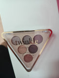 Paleta de sombras Twinkle de Lady Paris Cosmetics con 6 tonos en estuche triangular dorado